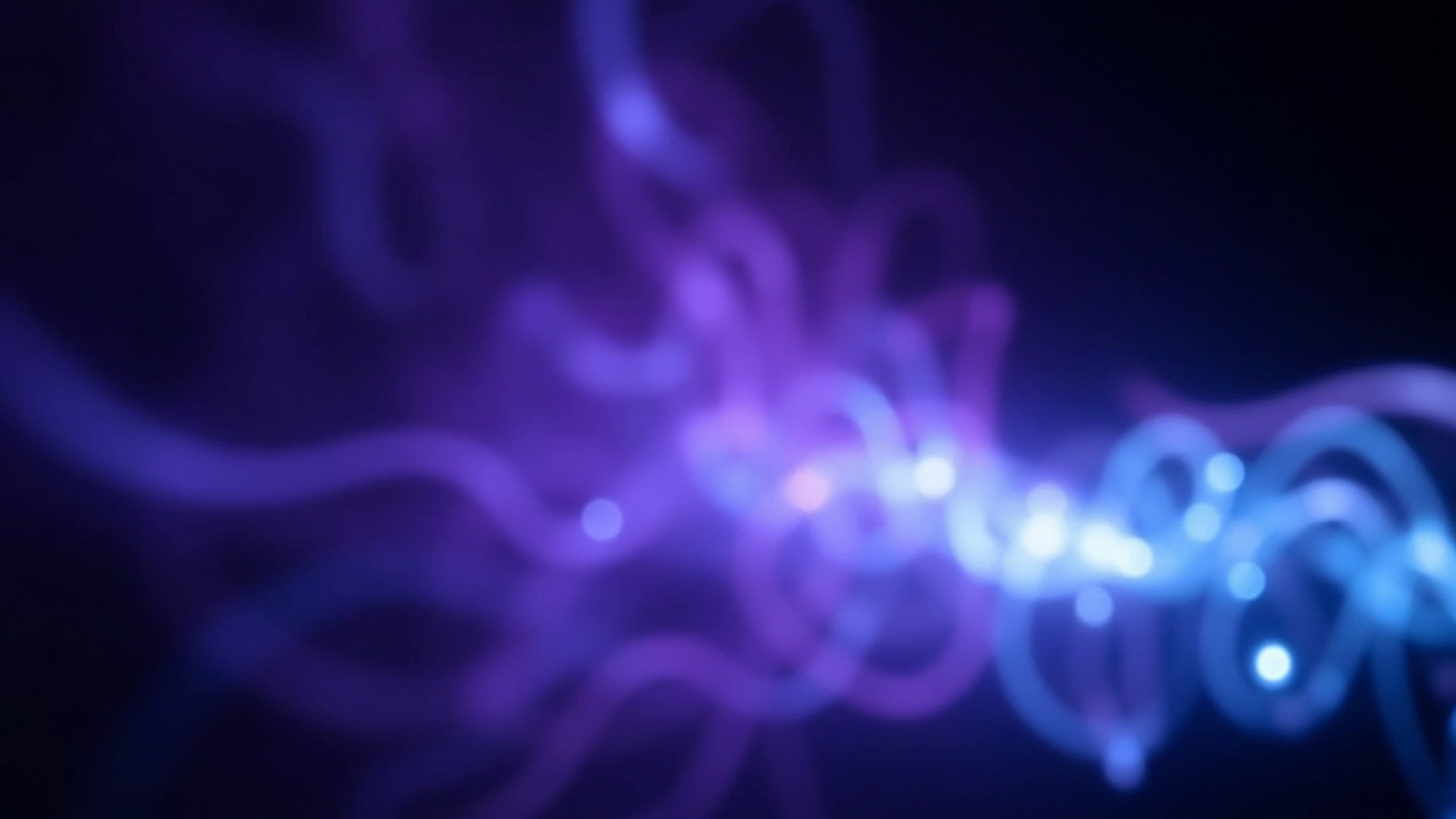 Bokeh light trails in soft purple and blue